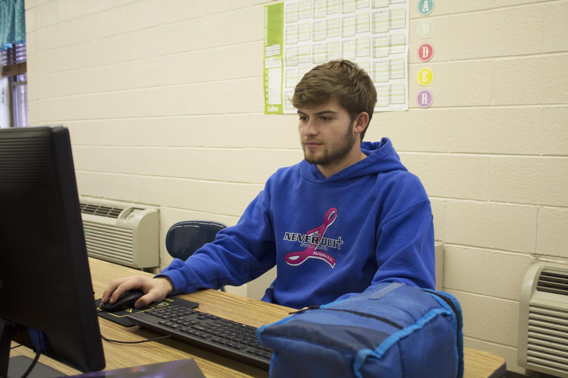 Student works on a computer Student works on a computer