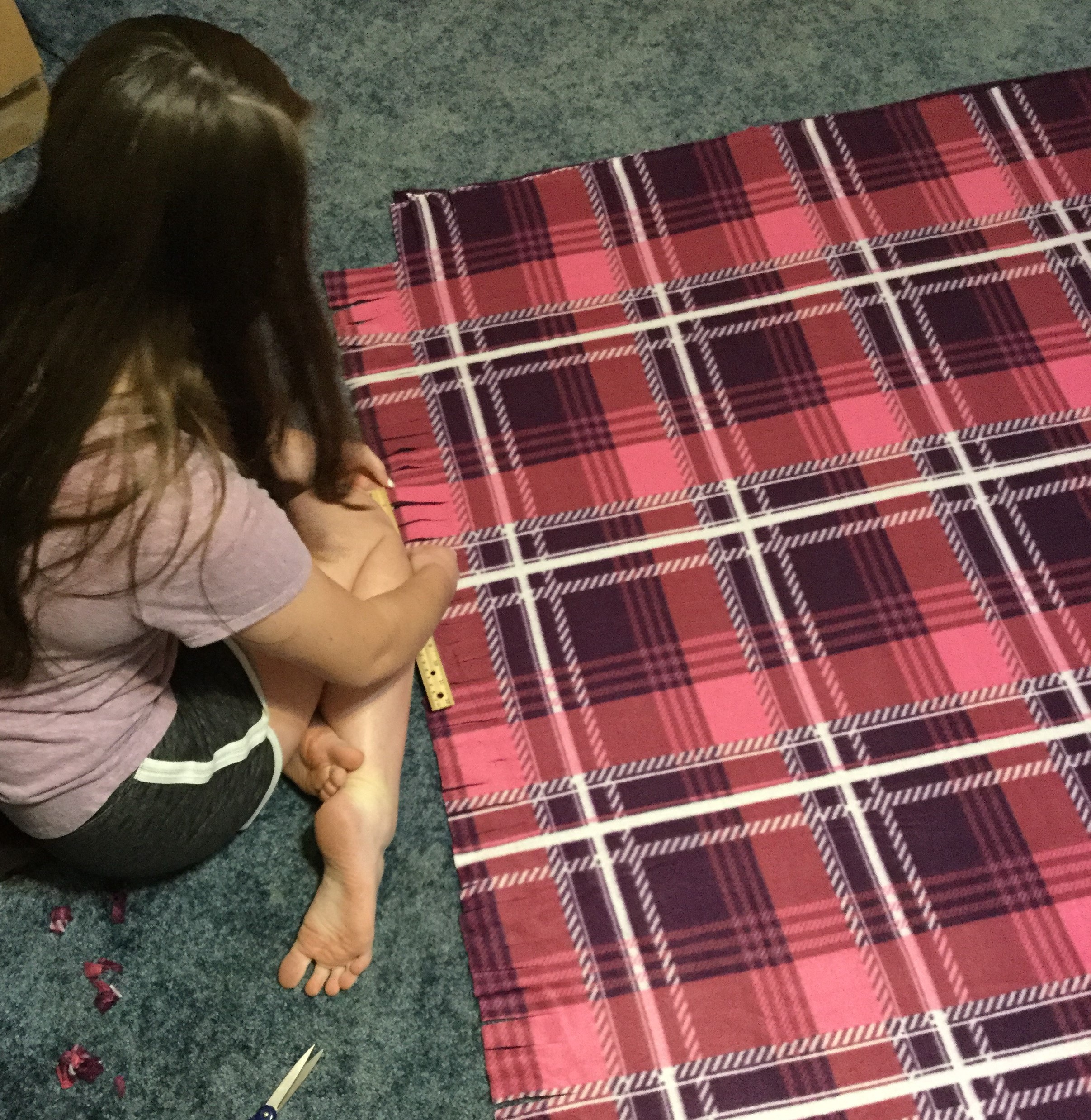 Students making blankets for Aledo nursing home residents