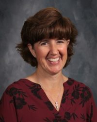 Female teacher's aide Female teacher's aide