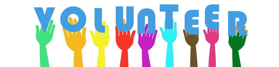 volunteer with different colored hands behind every letter