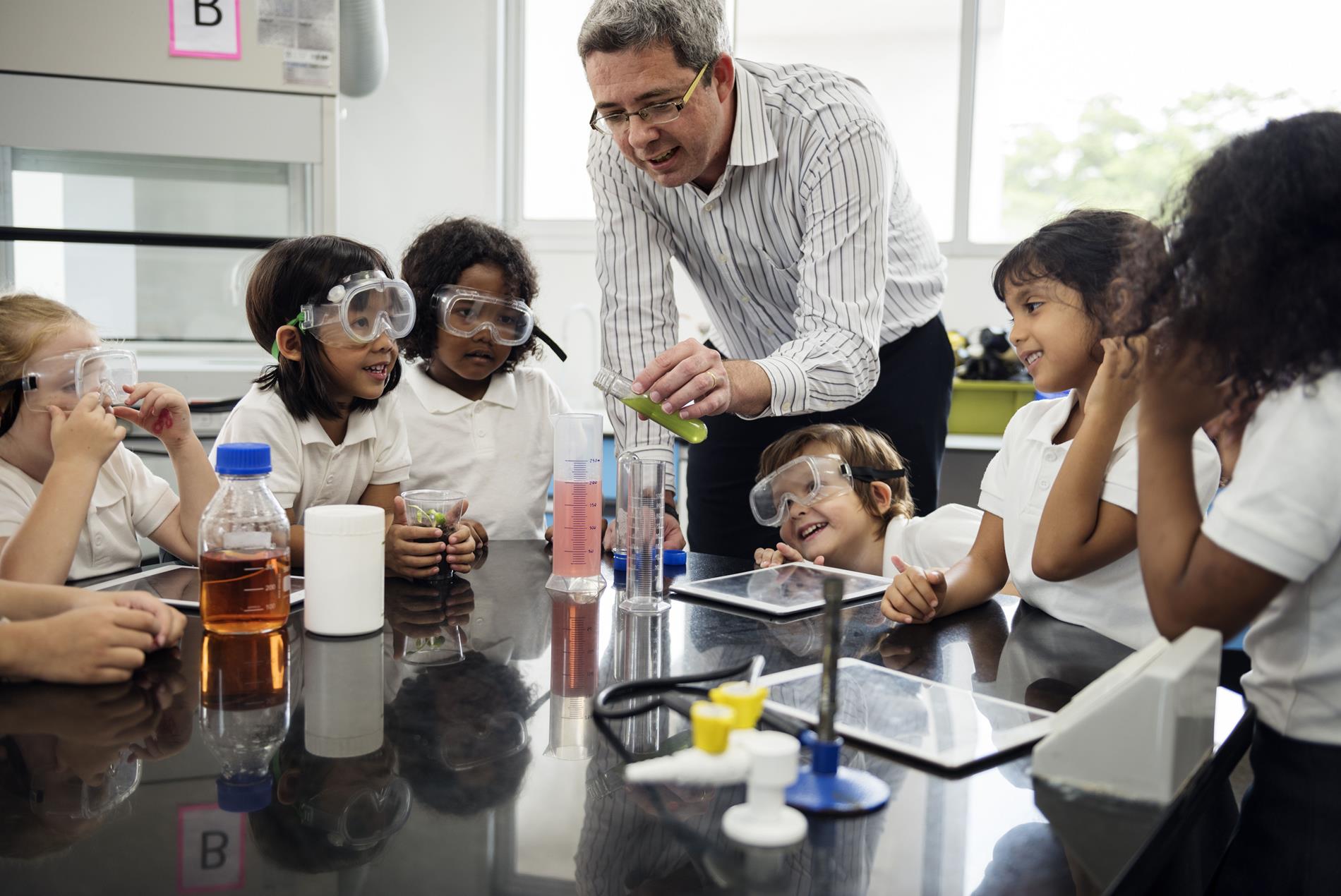 Science Teacher with students