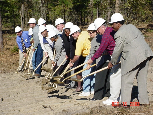 Members of the HCBOE join in the official groundbreaking.