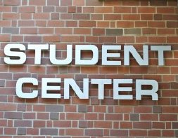 Brick wall with the text student center on it Brick wall with the text student center on it