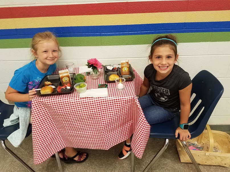 Students Use Lunch w/ a Friend Coupon