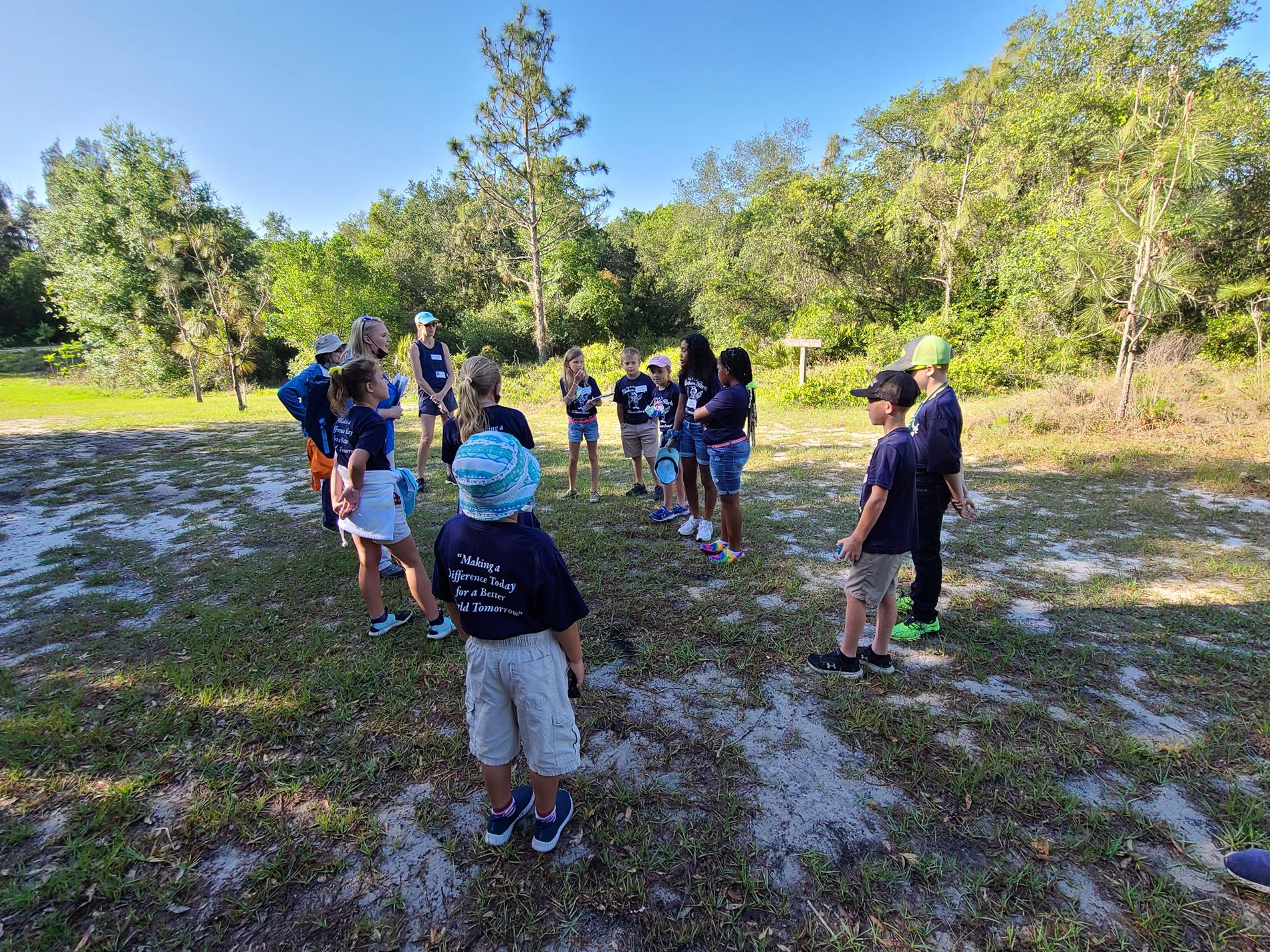 Students learning from their trail guides.