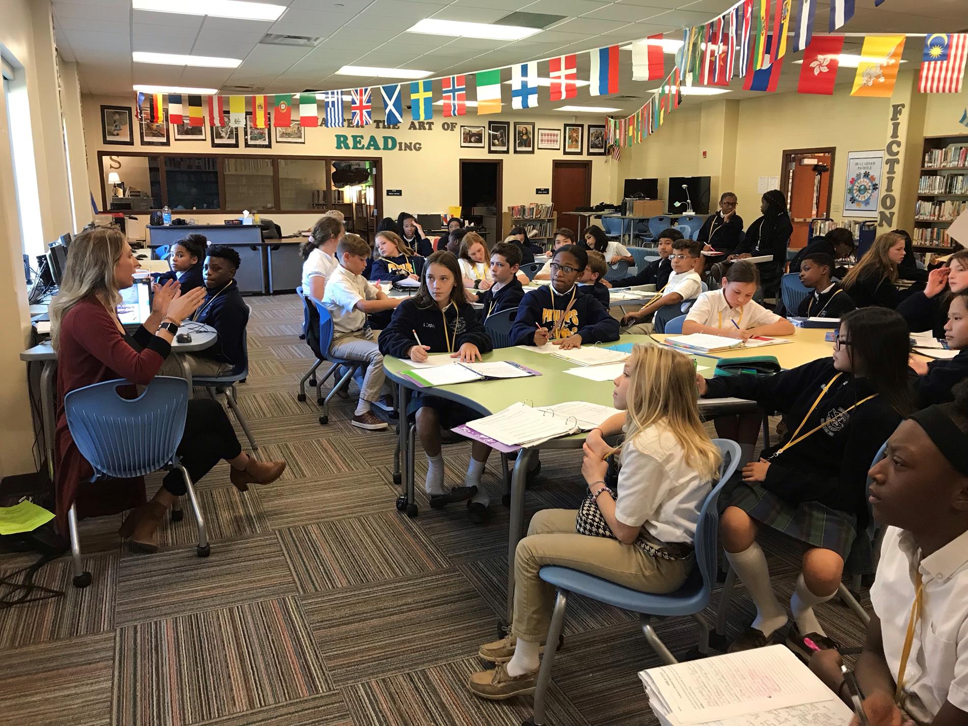 Students learning research skills from Mrs. Lacoste, the media specialist Students learning research skills from Mrs. Lacoste, the media specialist