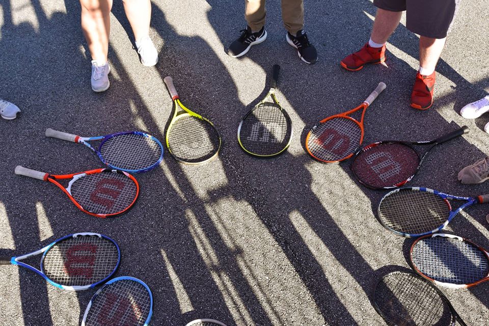 Tennis Rackets Lying on the Ground Tennis Rackets Lying on the Ground