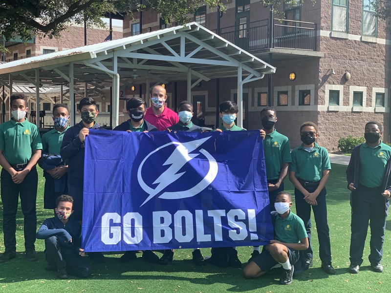 Students holding Lightning flag