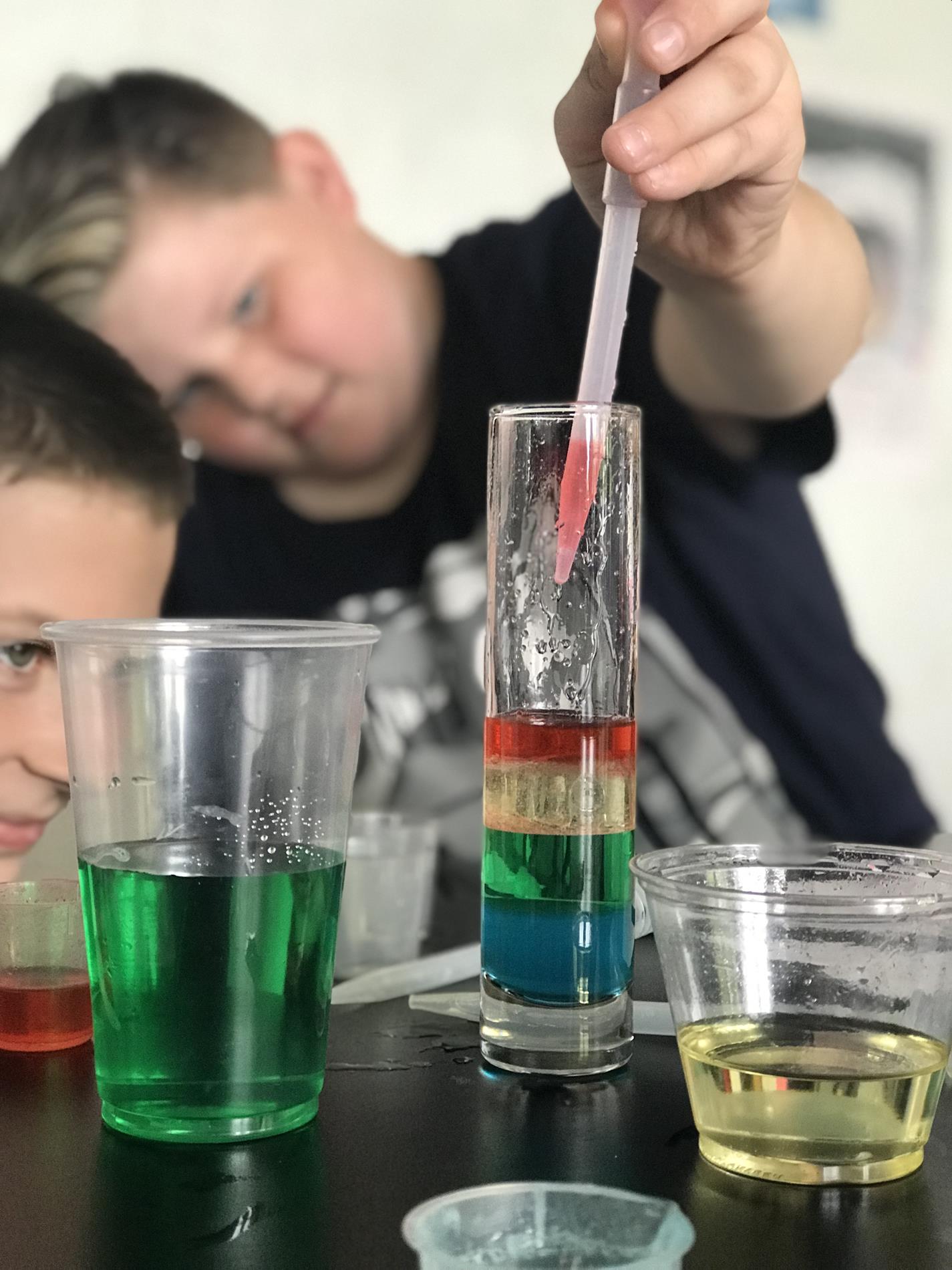 Students making a density tower