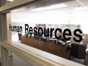 Human Resources text on glass