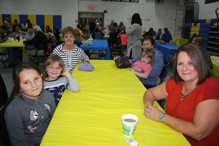 Elementary Students enjoying Breakfast with family