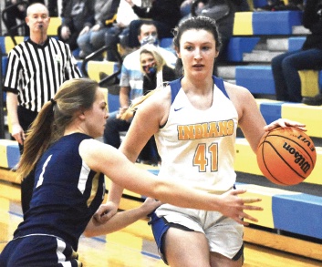 Southern's Ronni Mayfield brings the ball up the court against United's Madison Kibler on Thursday night. (Morning Journal/Justin Golba).