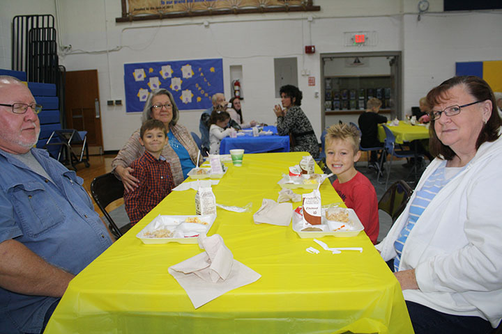 Elementary Students enjoying Breakfast with family
