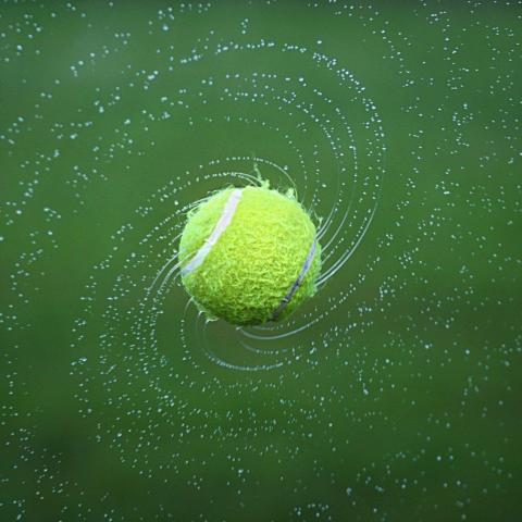 spinning tennis ball