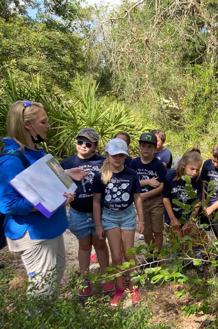 Ms. Washington's class learning facts along the trails.