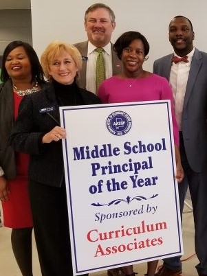 Principal Dennis receives the honor of "Principal of the Year" for the 2018-2019 school year.