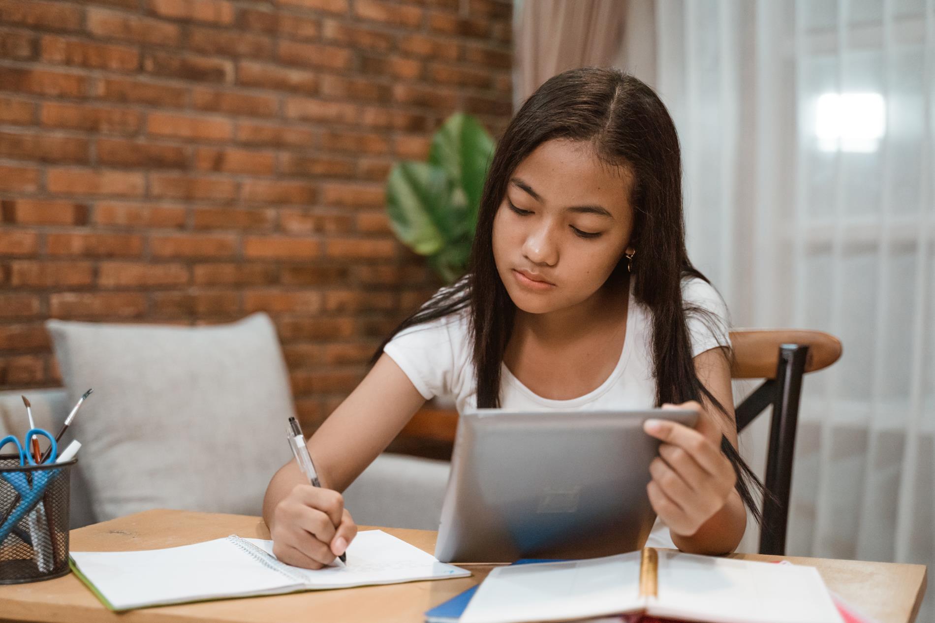 A female student studying at home A female student studying at home