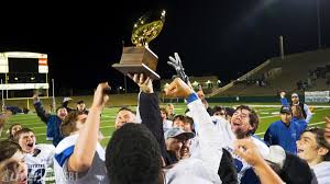 Players with championship trophy