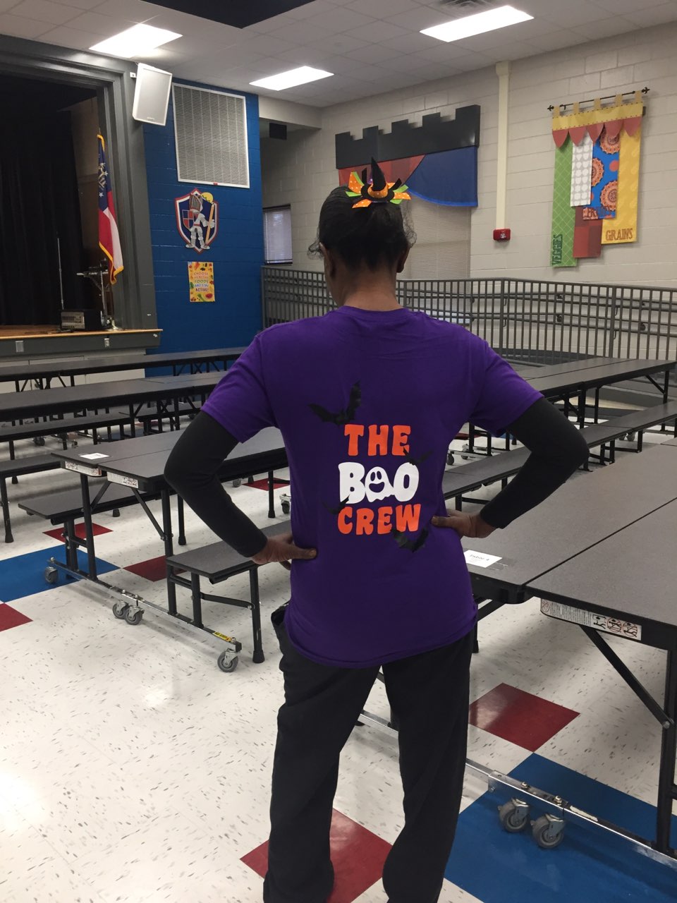 Ms. Jackie showing off the Boo Crew Shirt