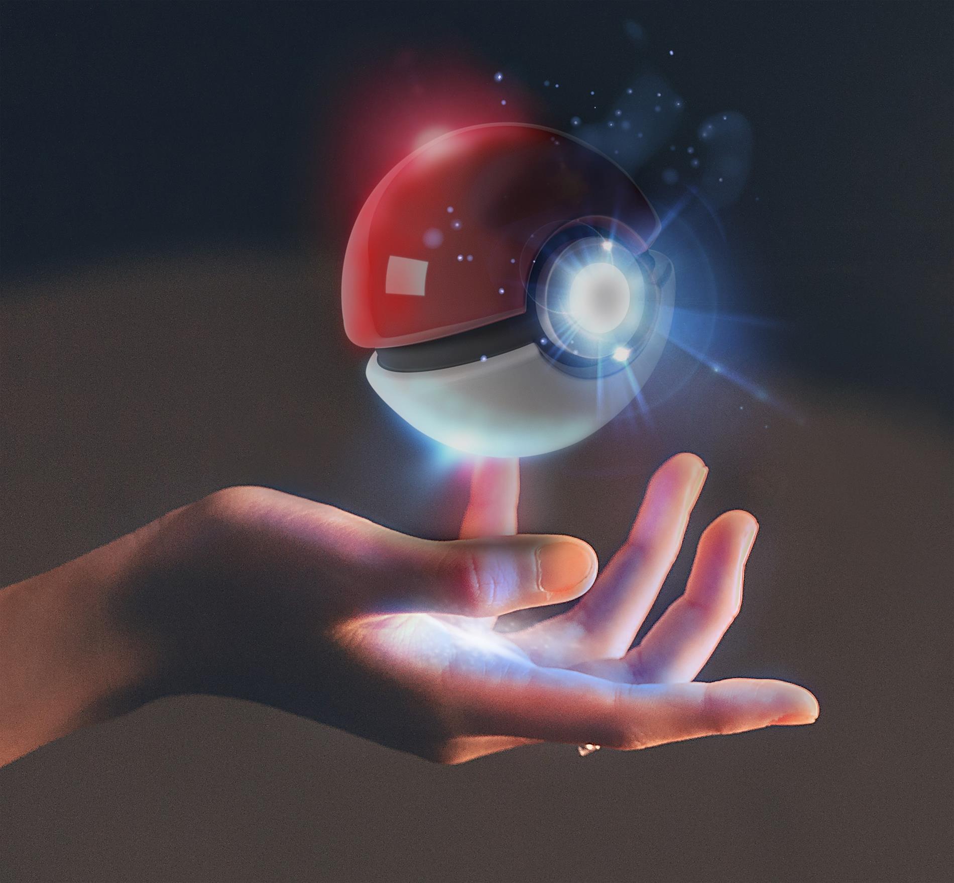 activating pokeball hivering above an open hand