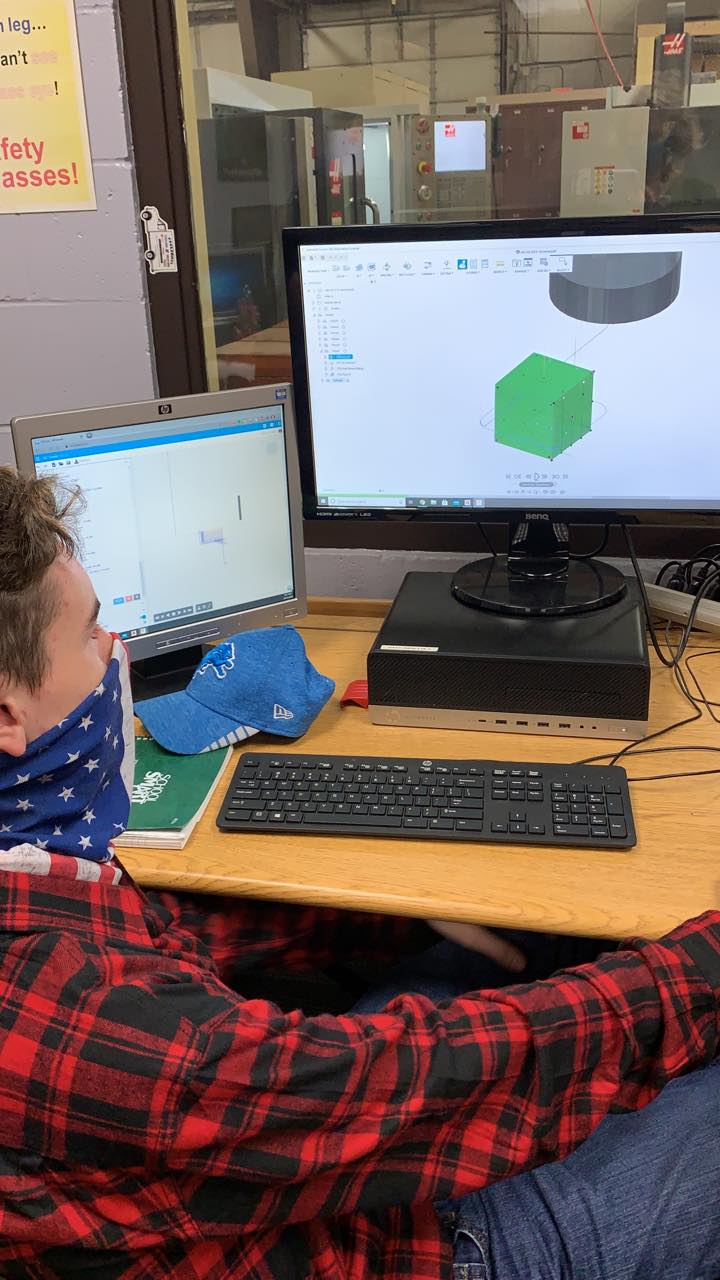 Using software to design a dice and then have the mill create it.