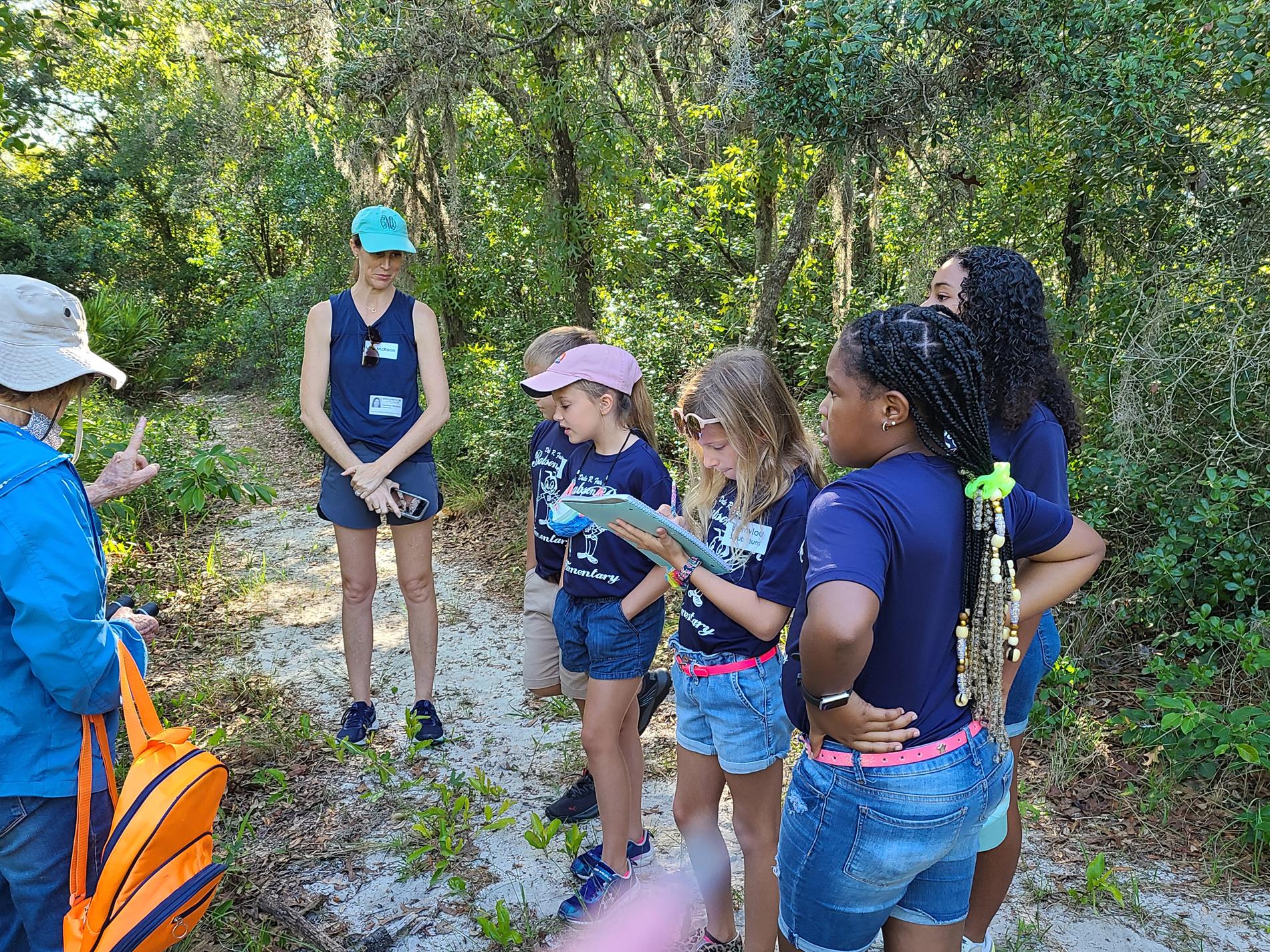 Mrs. Mercer's class listening to their trail guide.