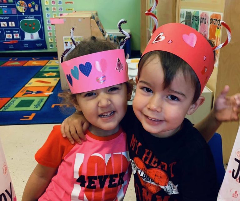 Kids in papercraft hats