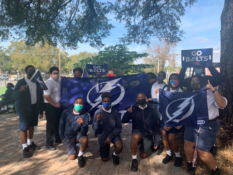 Students holding Lightning flag