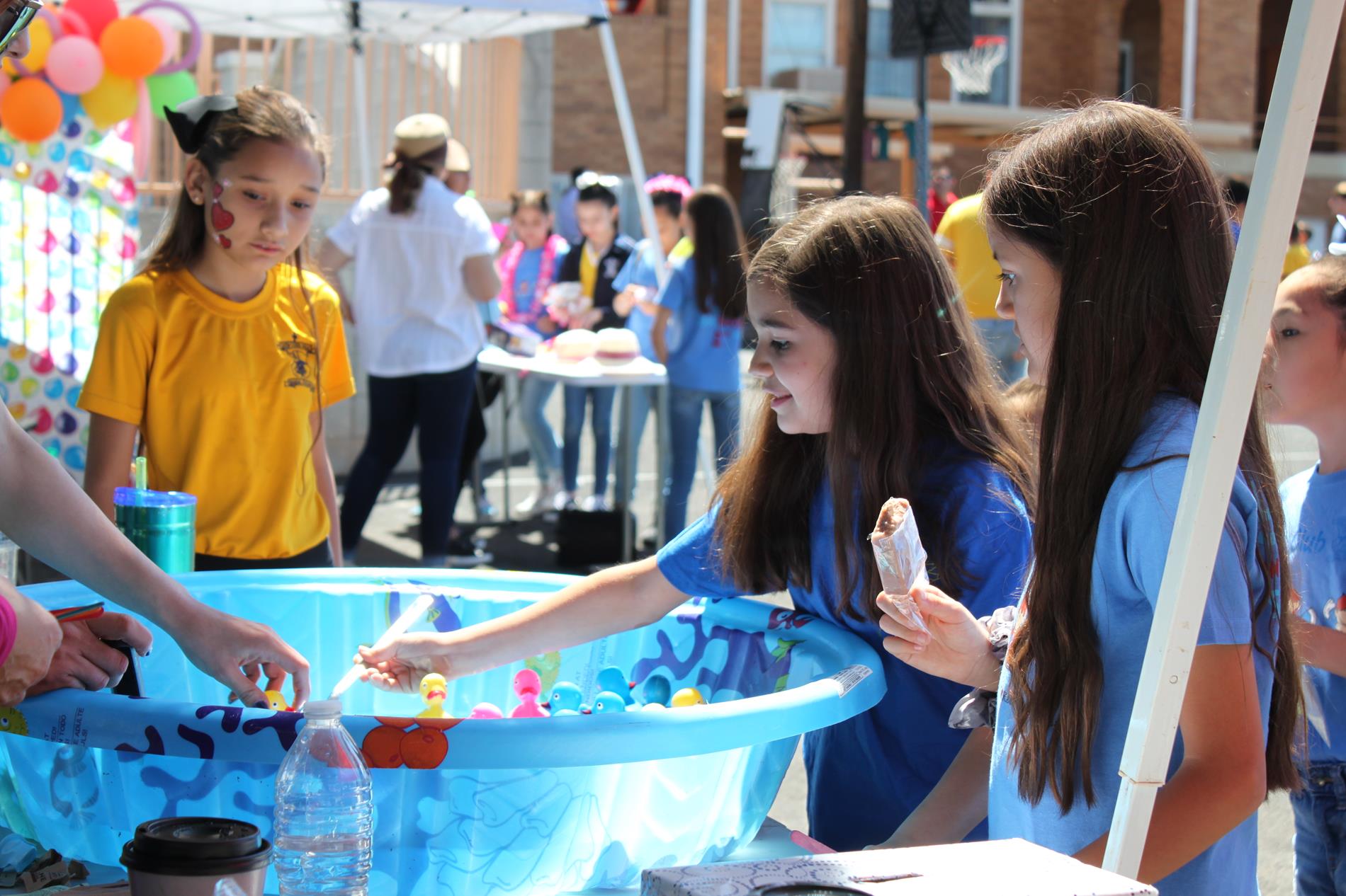 Student playing game with water