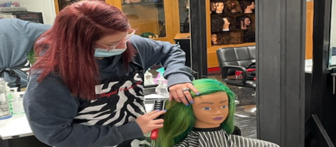 Student learning the technique  of hair color