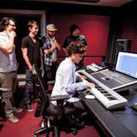 image of students doing audio production in studio