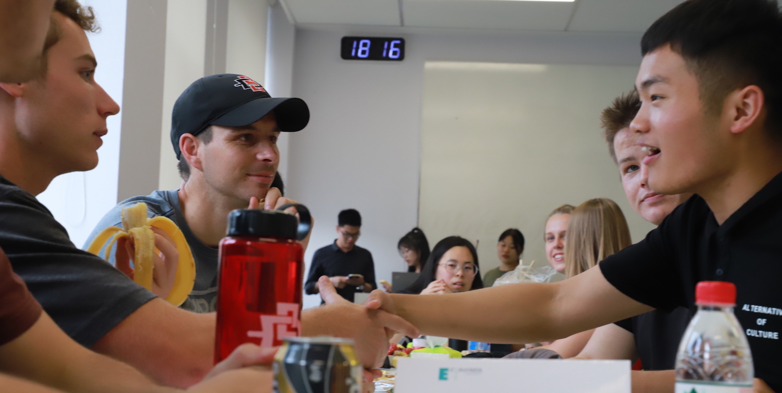 SRS Students shaking hands