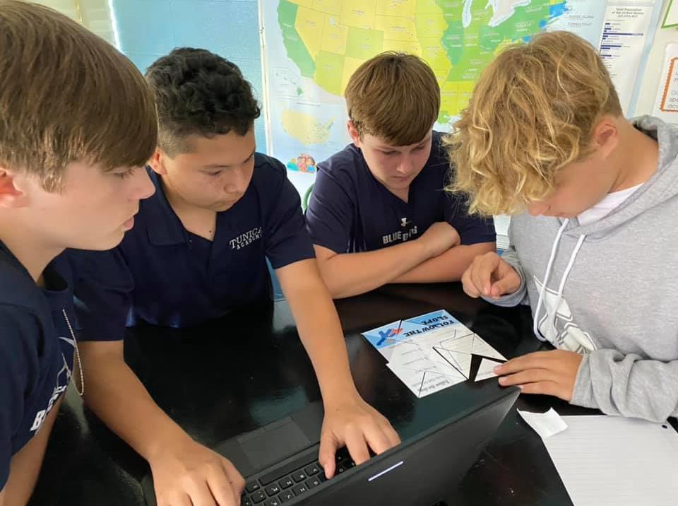 students working together in science groups