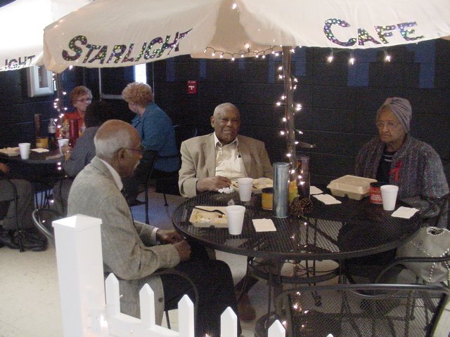 Parents around table at meeting